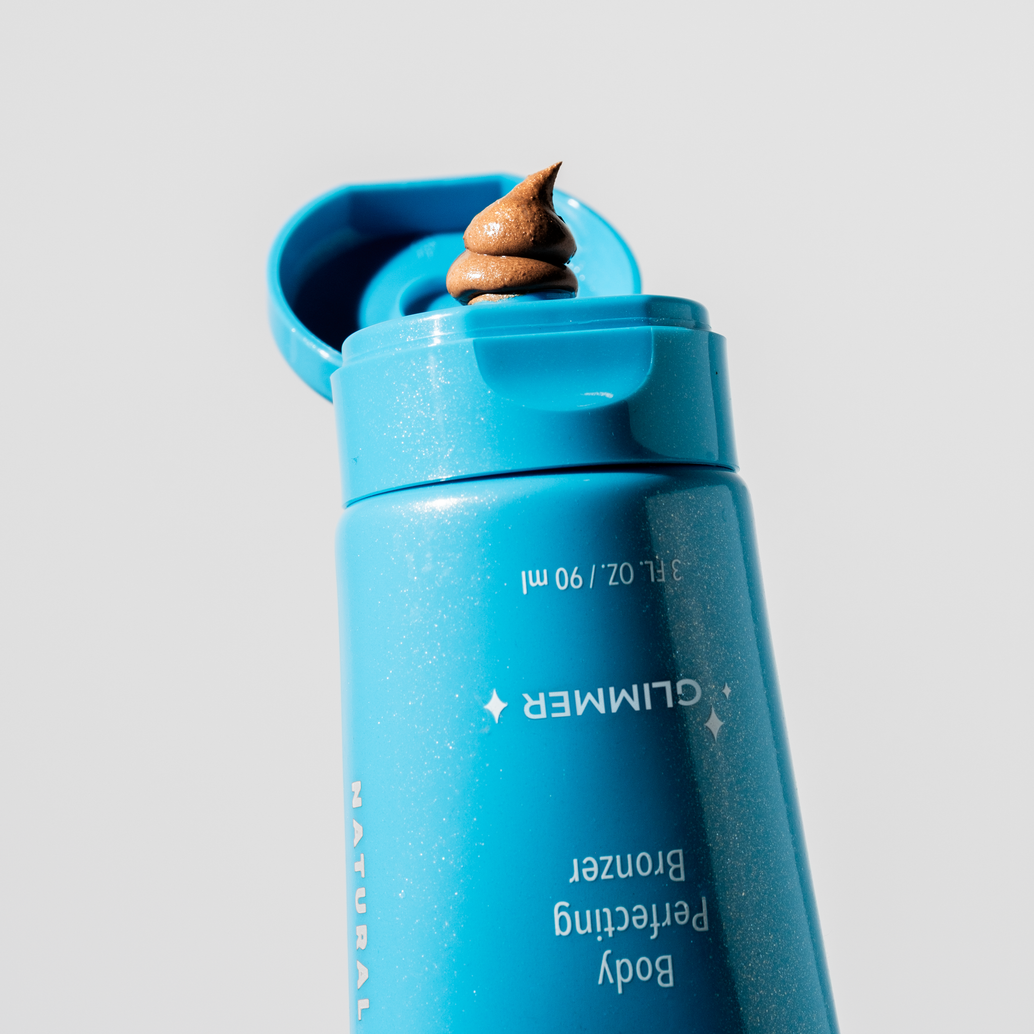 NEW!  Body Perfecting Bronzer w/ Glimmer